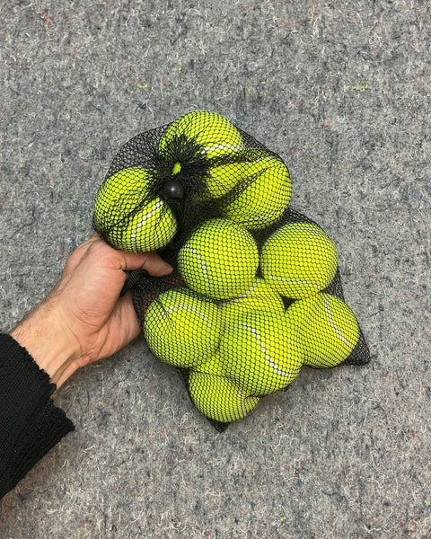 Bunch Of Tennis Balls in Mesh Bag