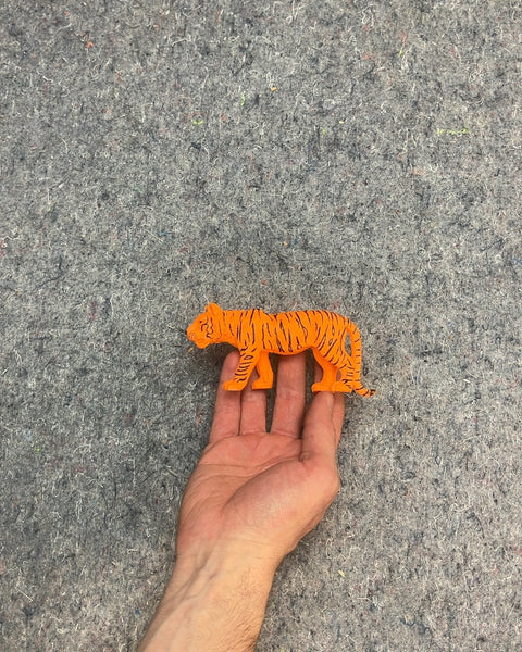 Just An Orange Plastic Tiger You Know?