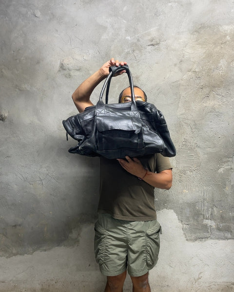 Vintage-y Leather Duffel Bag to Rob a Bank With