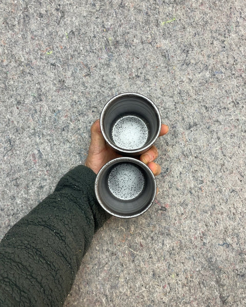 Two Ceramic Tumblers, Black and White