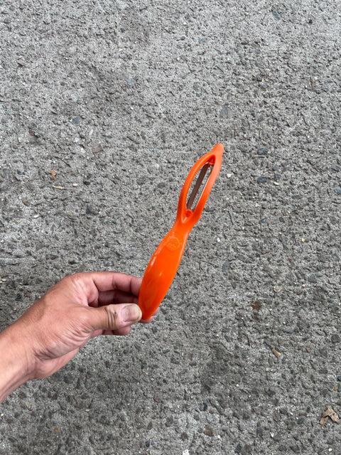 Orange Vegetable Peeler