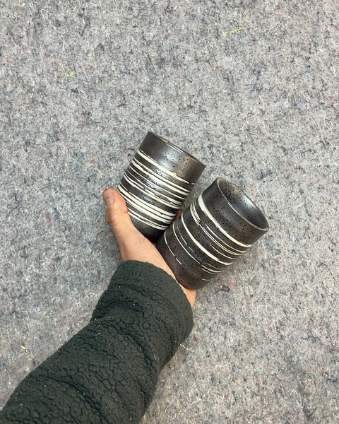 Two Ceramic Tumblers, Black and White